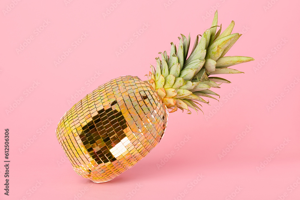 Fresh ripe pineapple on pink background