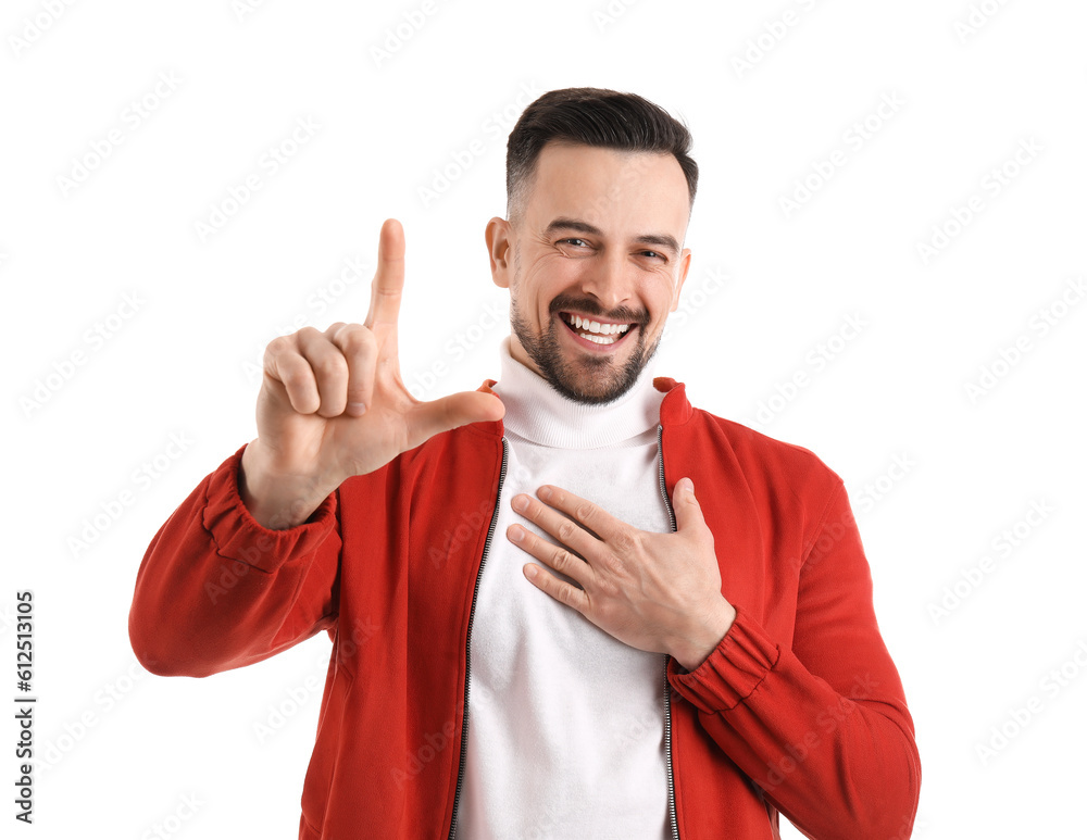 Handsome man showing loser gesture on white background