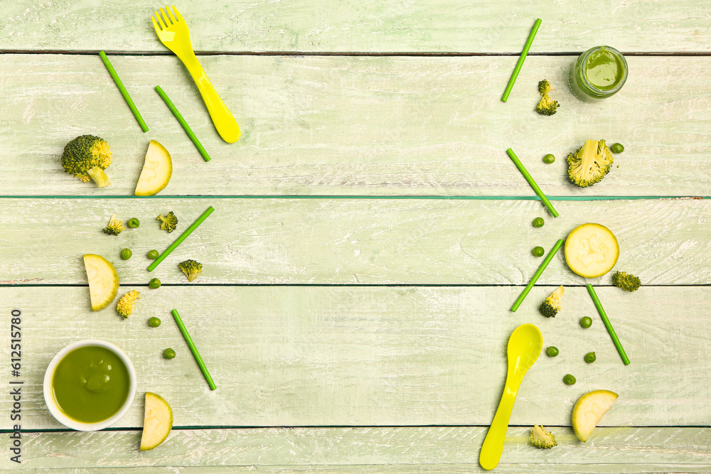 Composition with healthy baby puree, fresh vegetables and cutlery on color wooden background