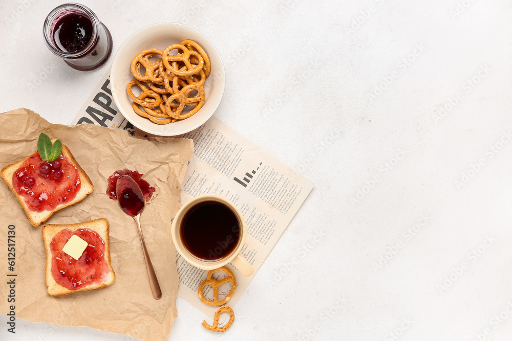 Tasty toasts with currant jam, cup of coffee and cookies on light background