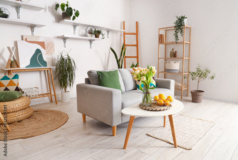 Interior of stylish living room with cozy sofa and coffee table