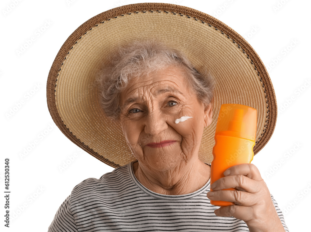 Senior woman with sunscreen cream on white background, closeup