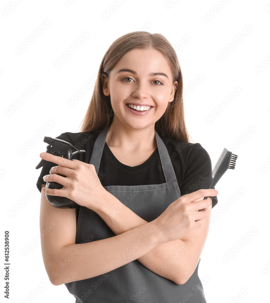 Female hairdresser with spray and brush on white background