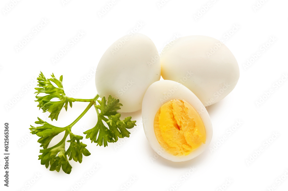 Boiled quail eggs with parsley on white background