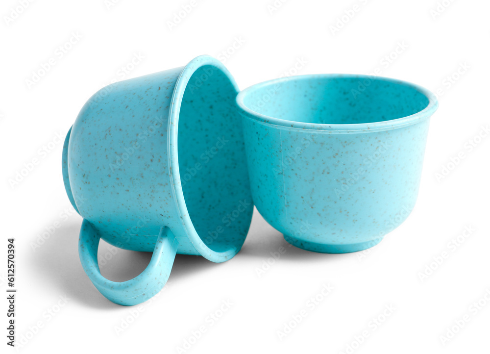 Blue cups isolated on white background. Childrens Day celebration