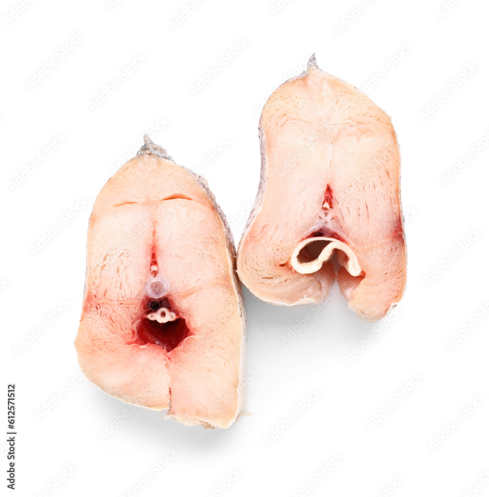 Pieces of raw codfish on white background