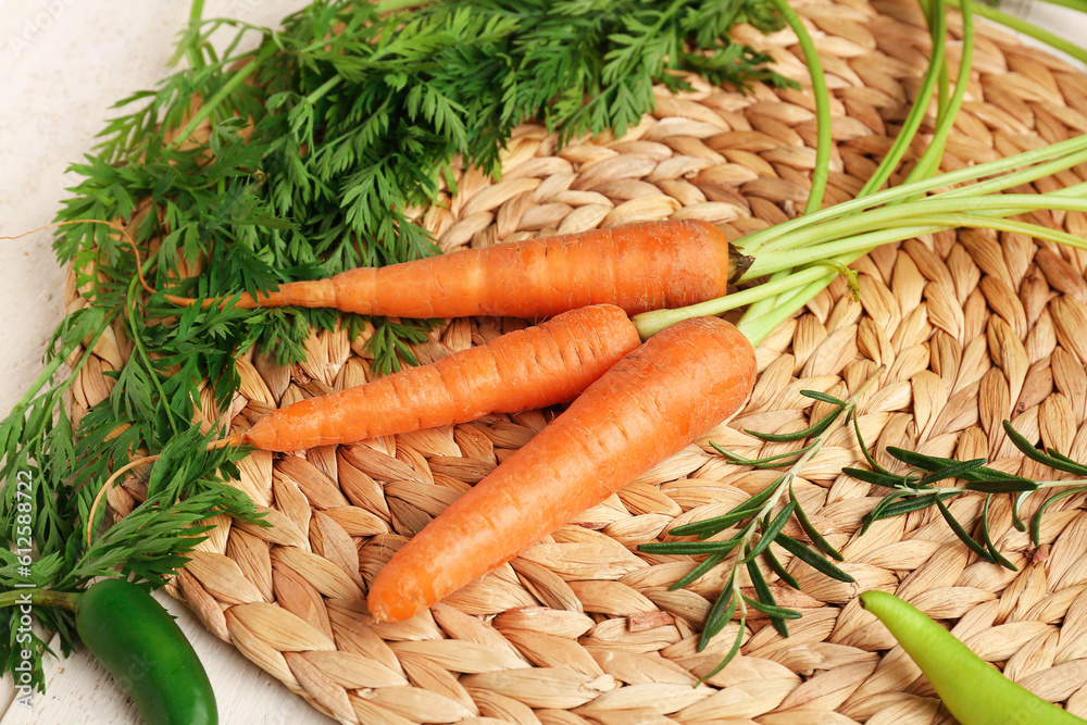 Fresh carrots with rosemary and chilli, closeup