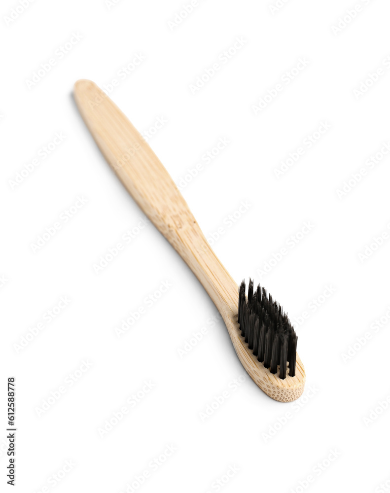 Bamboo toothbrush on white background