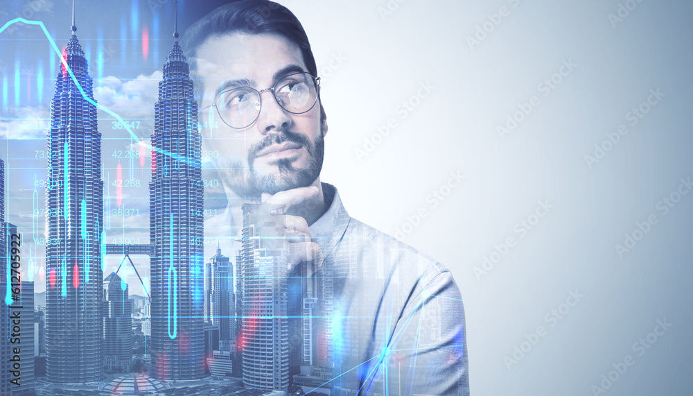 Portrait of attractive thoughtful young european businessman with glasses on abstract double exposur