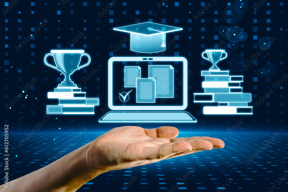 Higher education online and e-learning concept with man hand under digital trophy cups on book stack