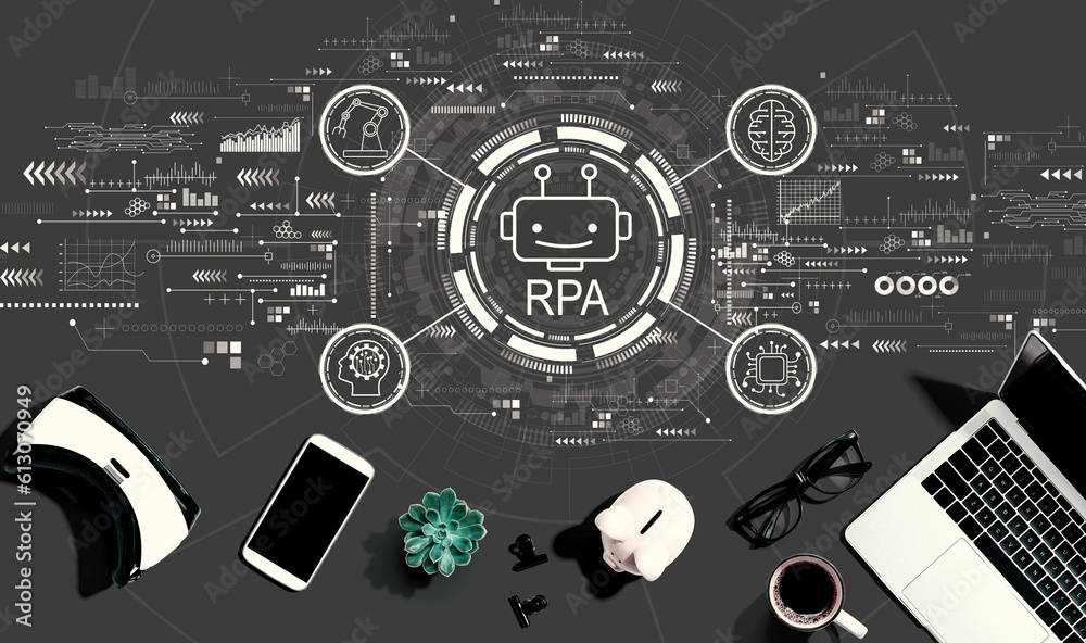 Robotic Process Automation RPA theme with electronic gadgets and office supplies - flat lay