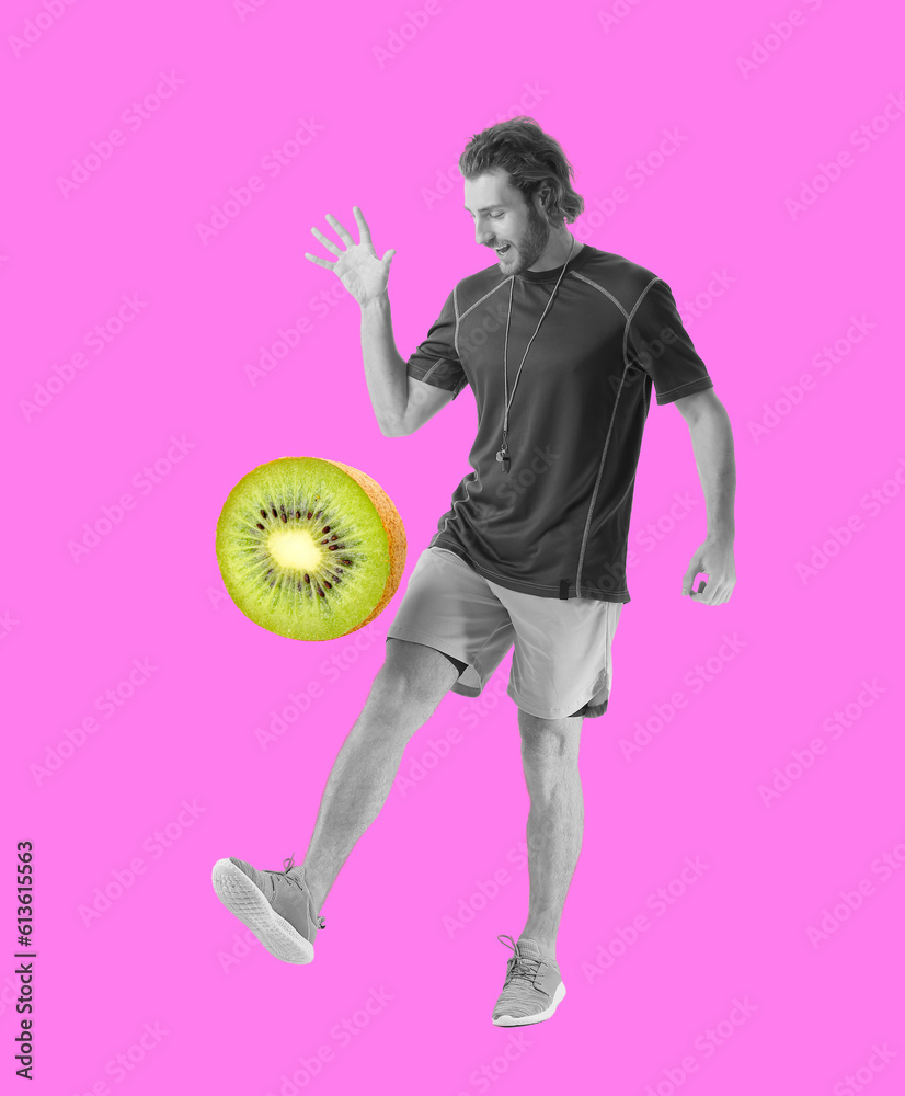 Sporty male coach with soccer ball on white background