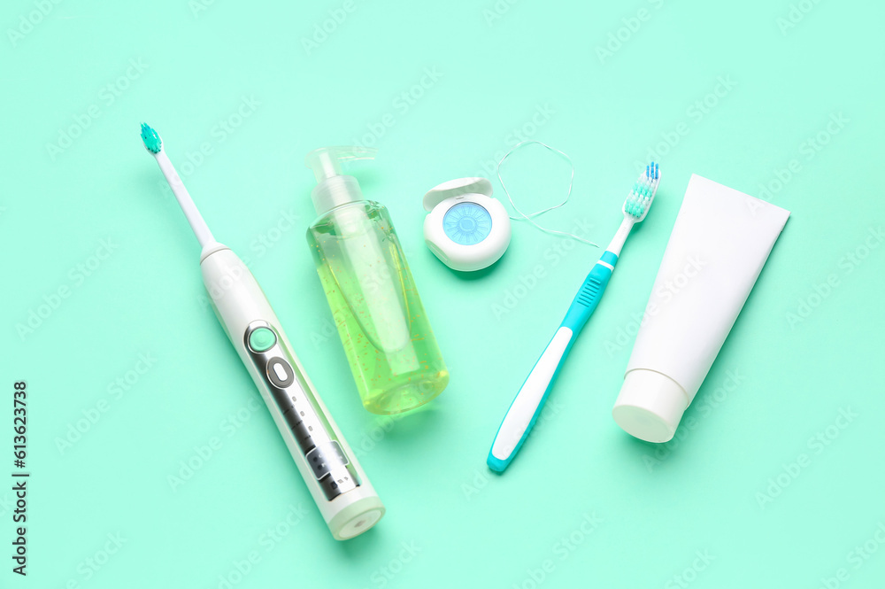 Set for oral hygiene on turquoise background