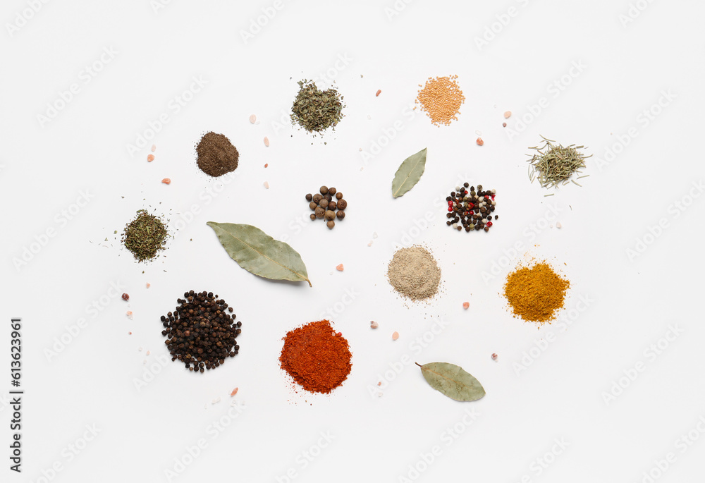 Composition with different fresh spices on light background