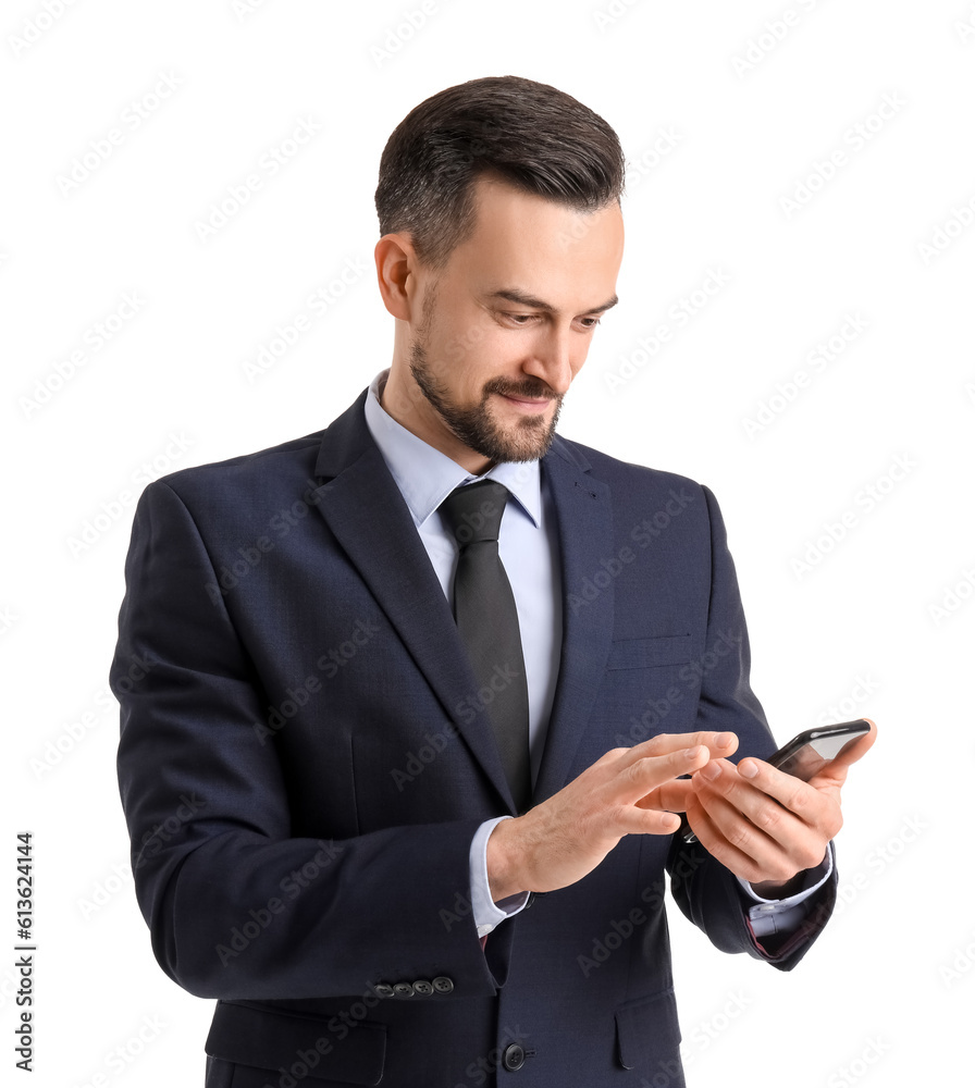 Handsome businessman using mobile phone on white background