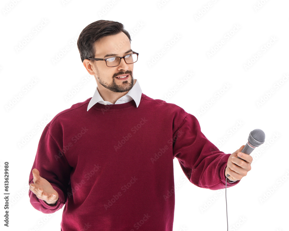 Male journalist with microphone on white background