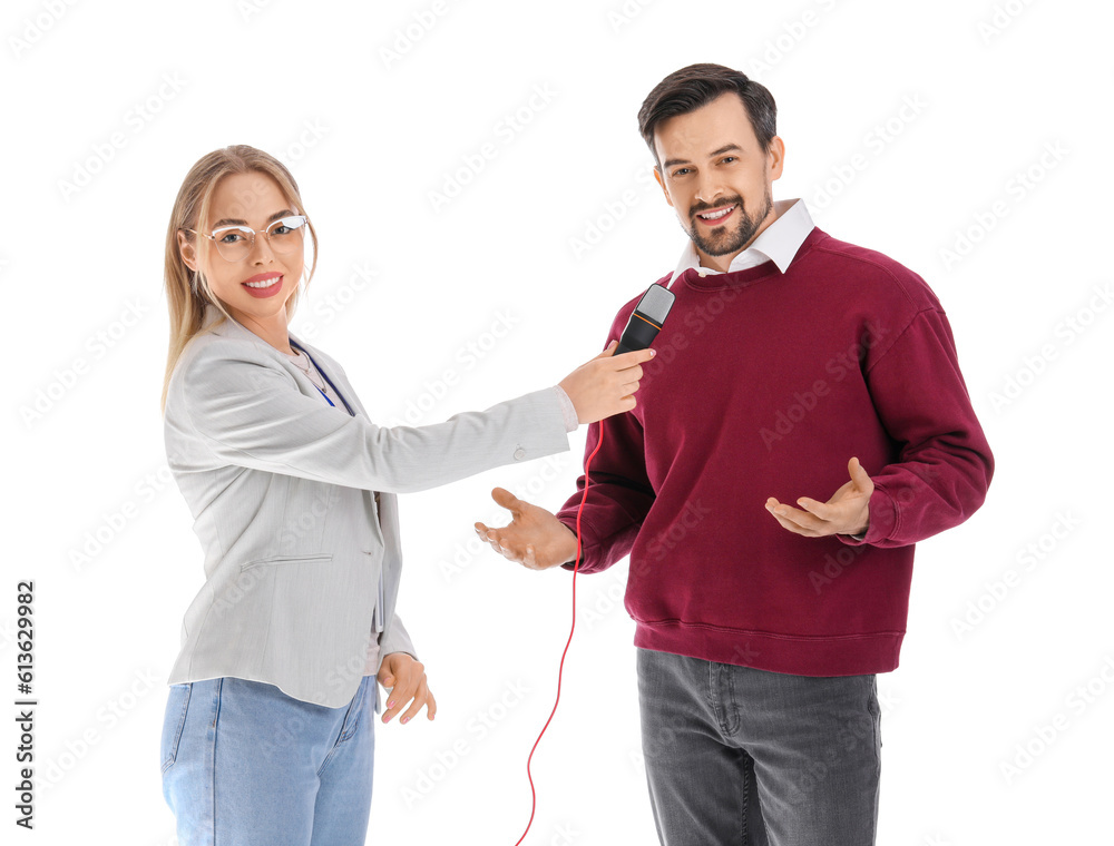 Female journalist with microphone having an interview with man on white background