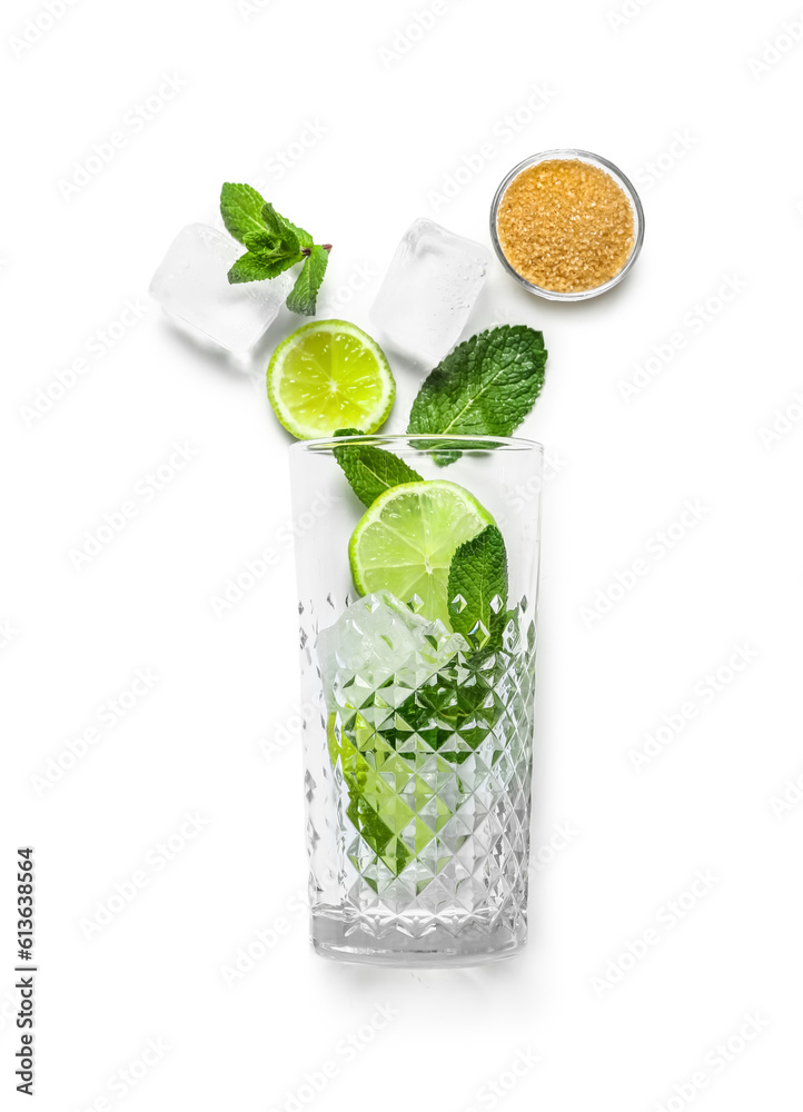 Glass and ingredients for preparing mojito on white background