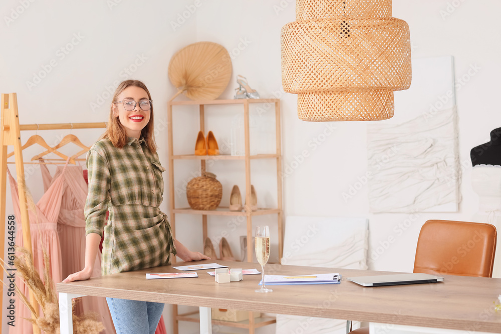 Female wedding planner working in office