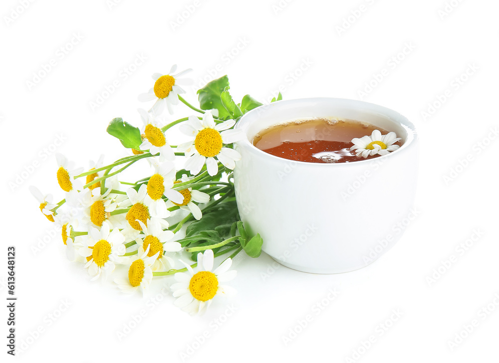 Bowl of honey and fresh chamomile flowers on white background