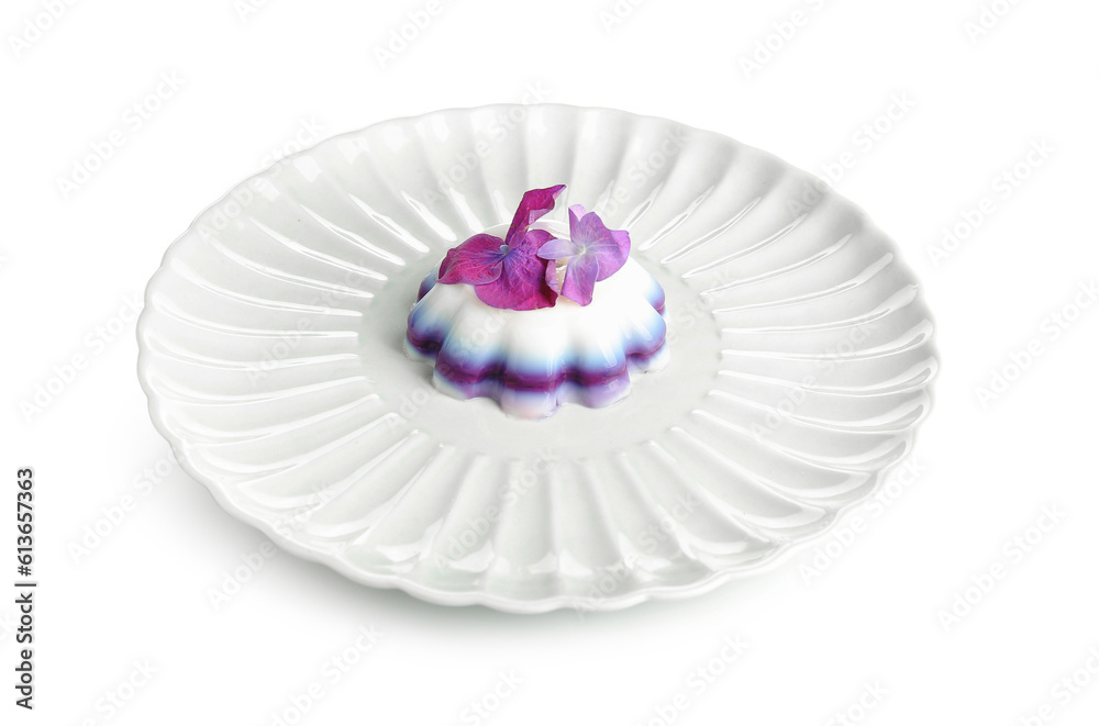 Plate of panna cotta with beautiful hydrangea flowers on white background