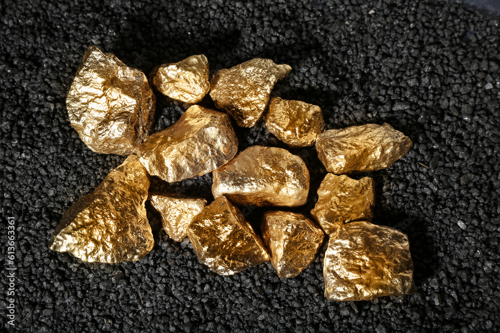 Golden nuggets on black coal