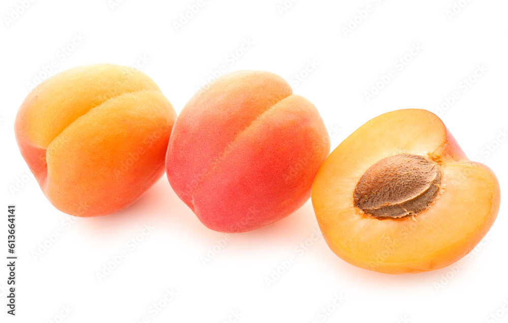 Ripe apricots isolated on white background