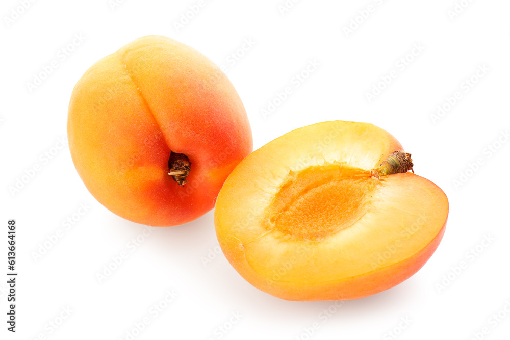 Ripe apricots isolated on white background