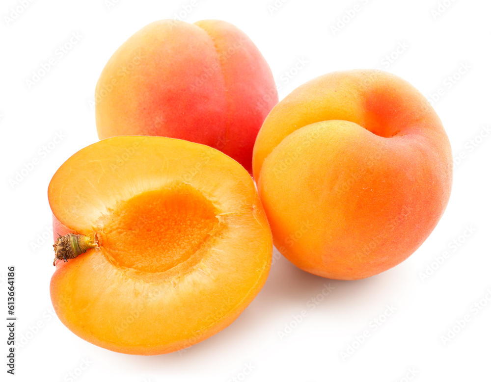 Ripe apricots isolated on white background