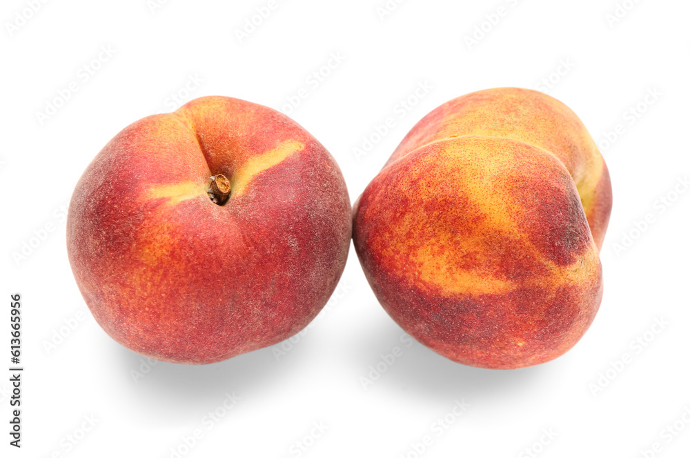 Sweet peaches on white background