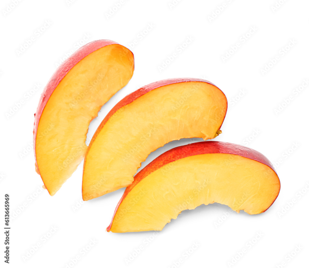 Cut sweet peach on white background