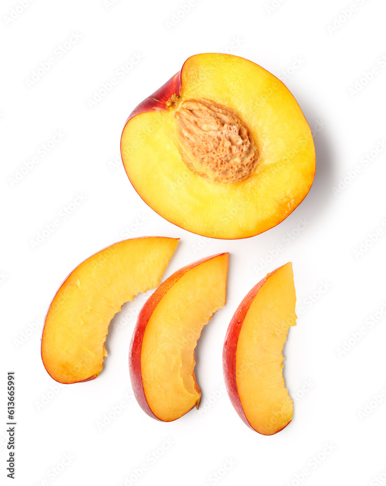 Cut sweet peach on white background