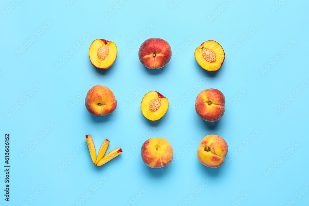 Sweet peaches on blue background