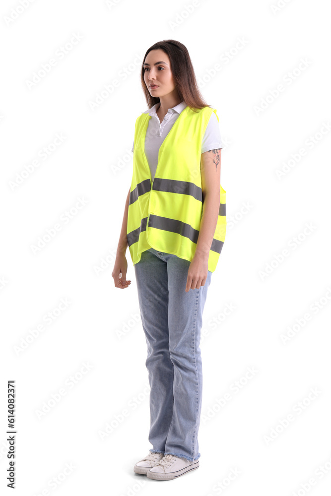 Female worker in vest on white background