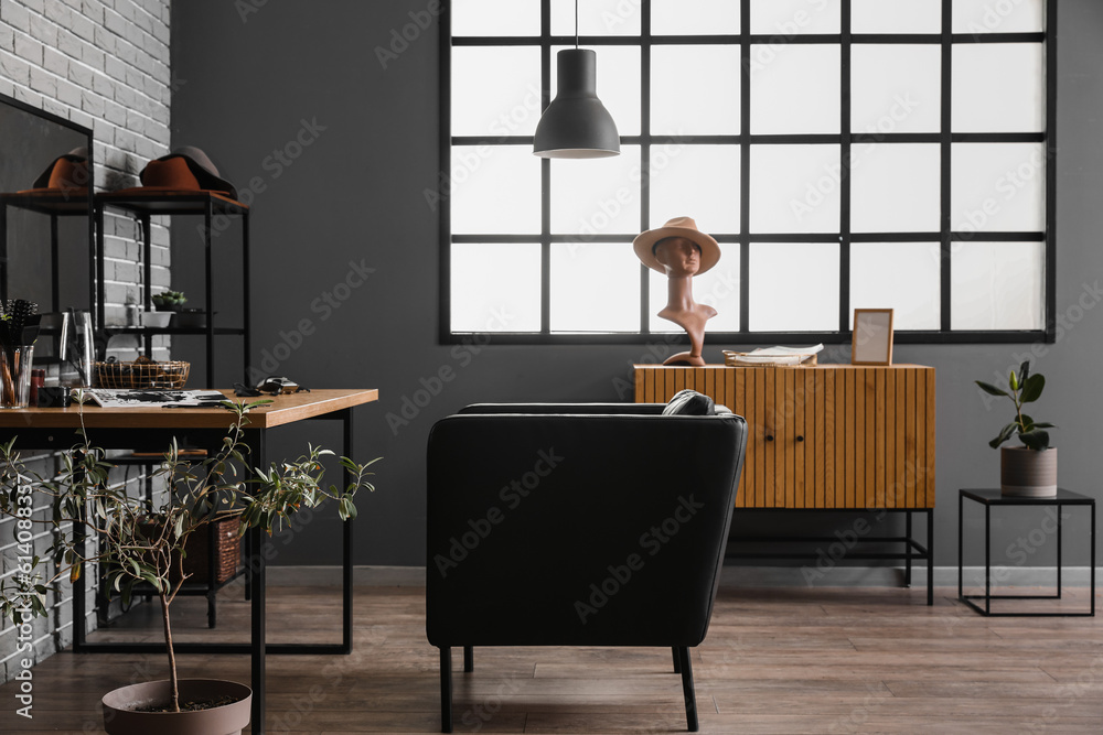 Interior of beauty salon with hairdresser table and armchair