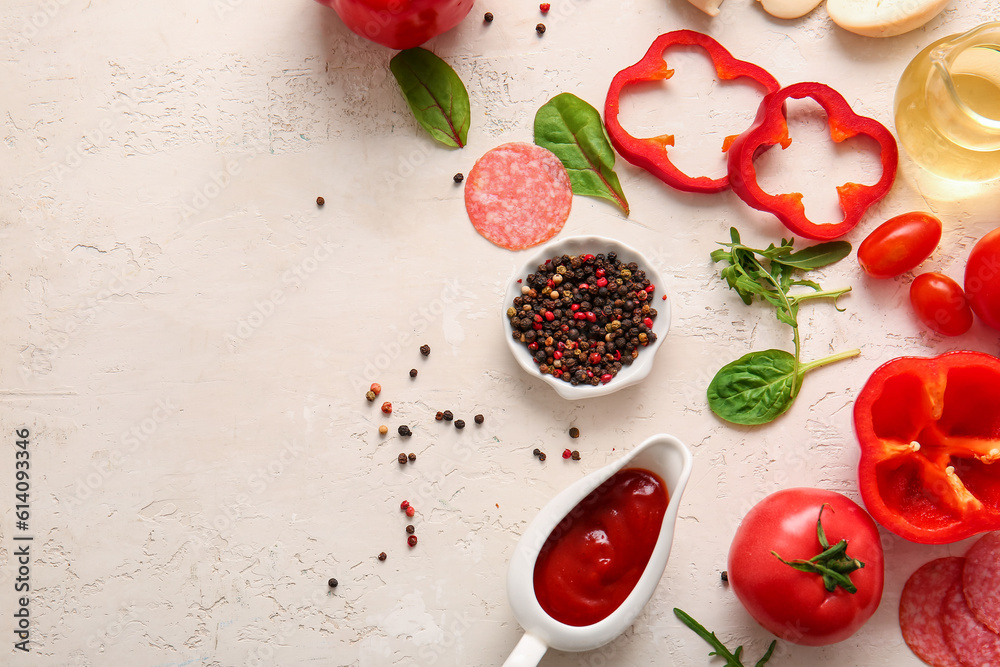 Different ingredients for preparing pizza on light background