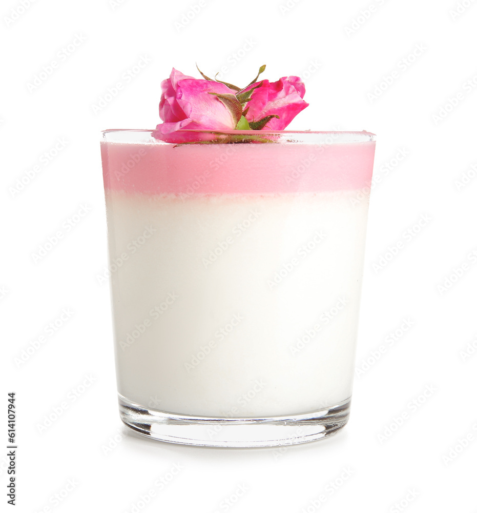 Glass of panna cotta with beautiful pink rose flowers on white background