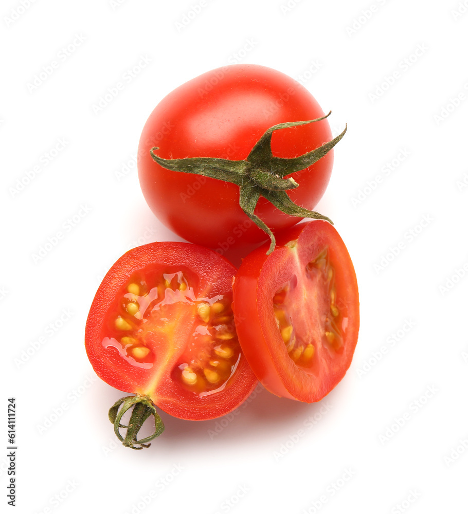 Slices of fresh cherry tomatoes on white background