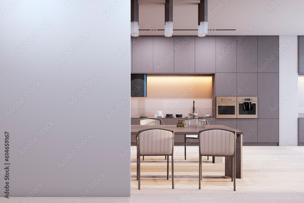 Front view of blank light wall with place for image frame or poster in a modern kitchen interior wit