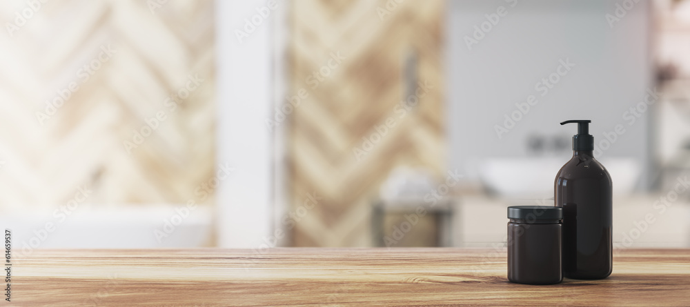 Empty wooden table top in bathroom interior with blurred background and black bathroom accessories, 