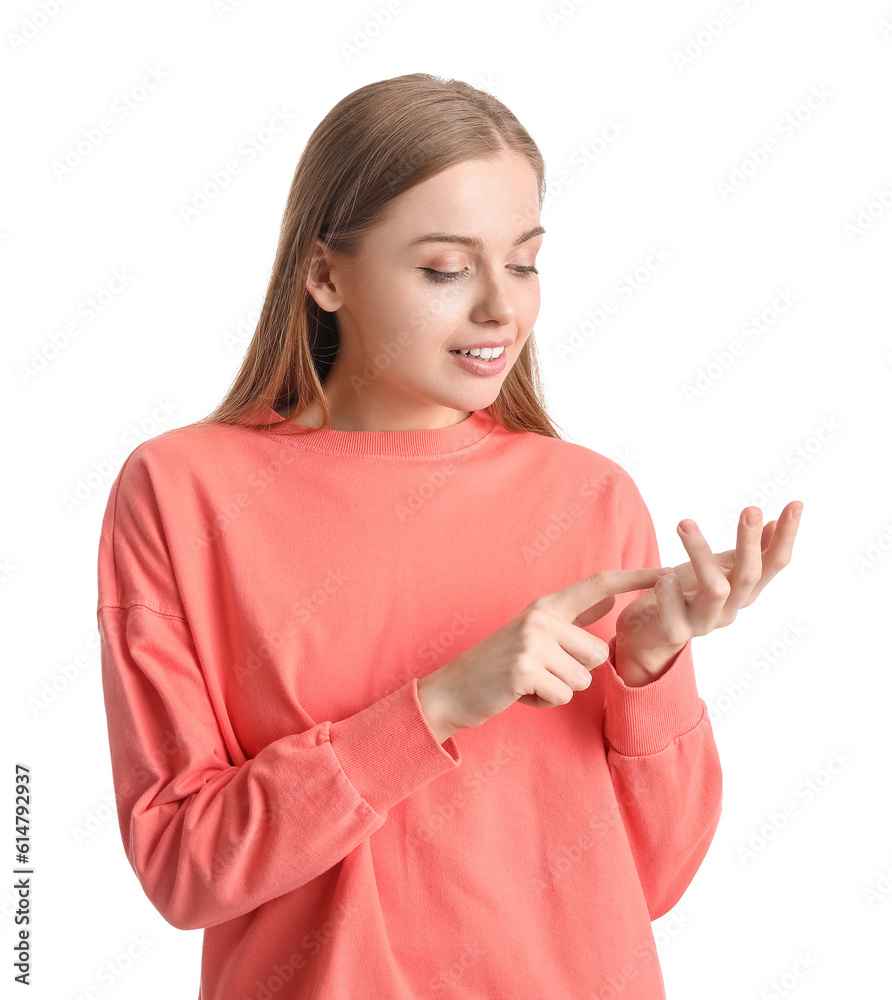 Young woman in red sweatshirt counting on white background