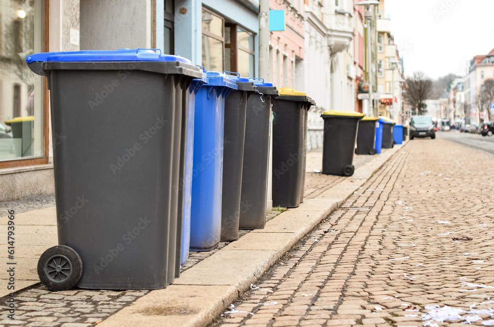 Garbage containers on city street