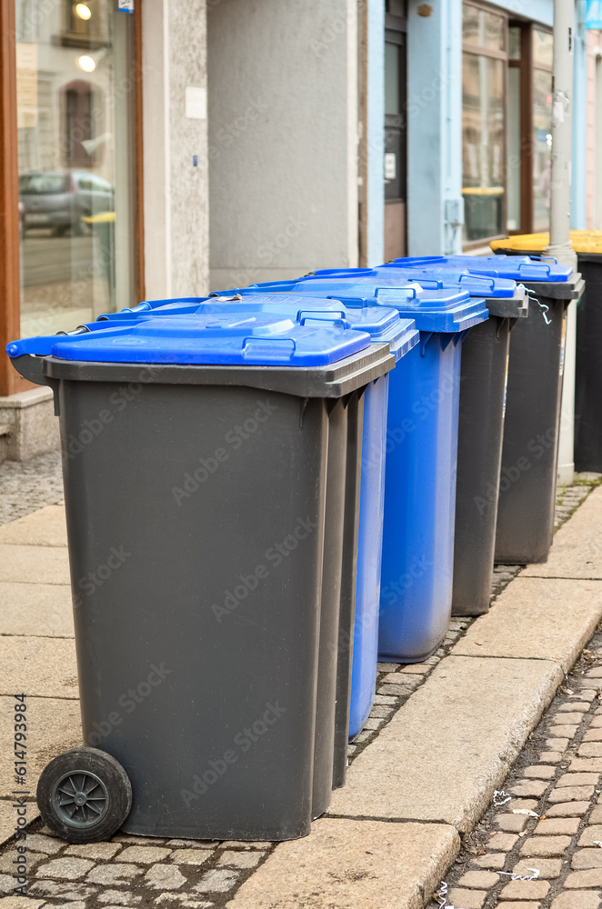 Garbage containers on city street