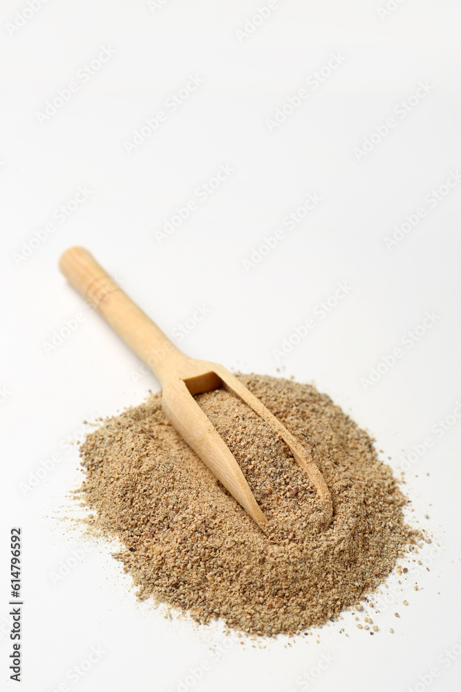 Wooden scoop with fresh spices on white background