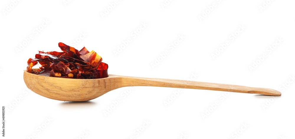 Wooden spoon with sliced chili pepper on white background