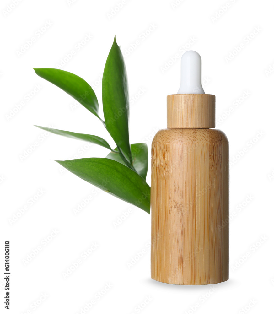 Bottle of cosmetic oil with plant twig on white background