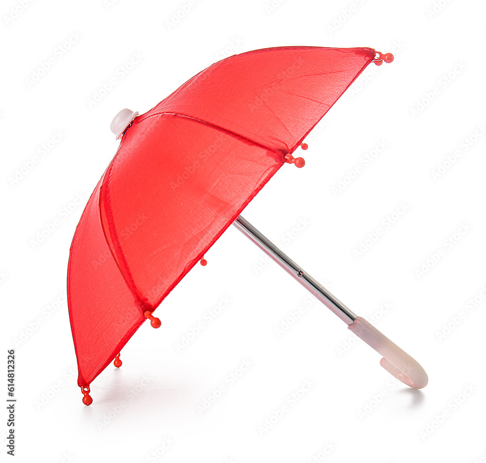 Mini red umbrella on white background