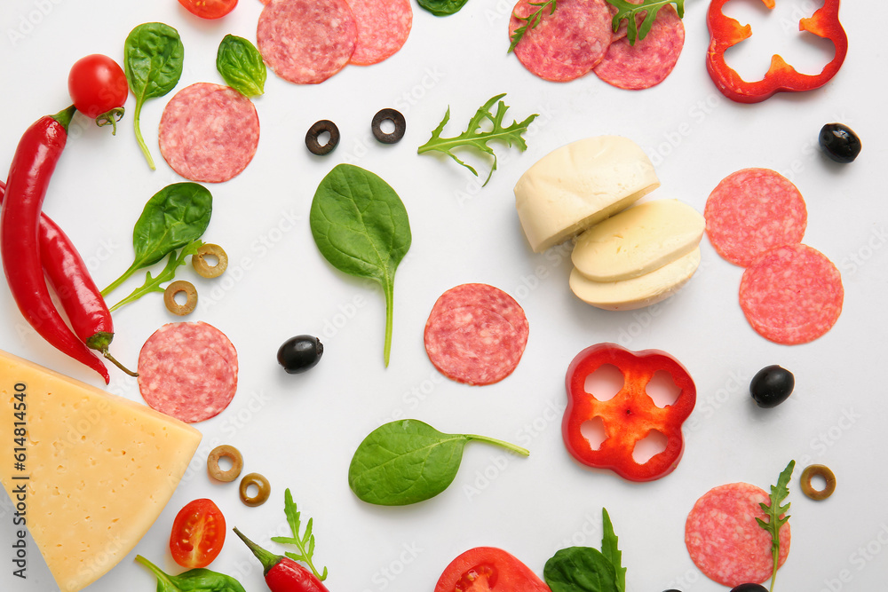 Fresh ingredients for preparing pizza on white background