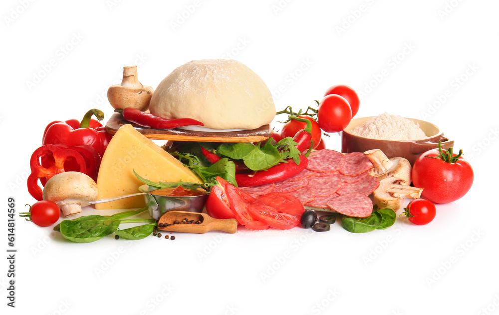 Raw dough and ingredients for preparing pizza on white background