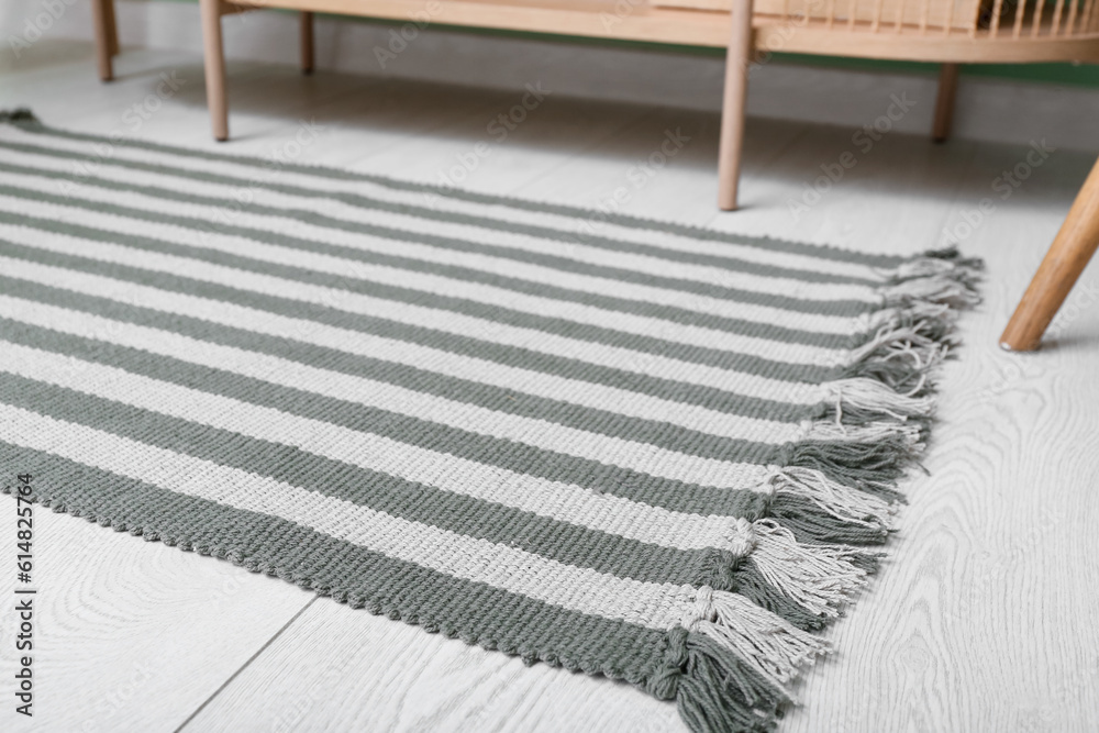 Soft rug on floor in living room, closeup